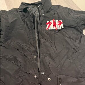 Agora Black Windbreaker with Red and White Accents
